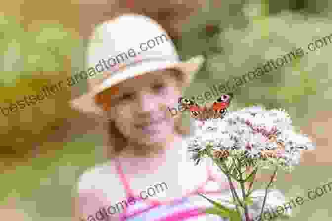 A Baby Looking At A Butterfly On A Flower Nature First Words Natur Erste Worte BILINGUAL BABY 2+ English German Bilingv Academy (mini Bili Dual Language English German For 2+ 7)