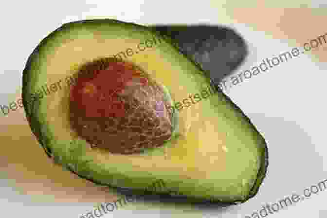 A Ripe Avocado Cut In Half The Top 10 Paleo Diet Foods You Absolutely Need (The Everyday Paleo Diet Guide 1)